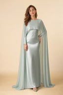 Yasmine mint green modest evening dress with chiffon cape, full-length front view