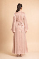 Camille beige velvet evening dress, full length back view on model