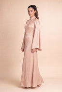Camille beige modest velvet dress, three quarter front view, high neckline and bell sleeves