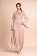 Skirt of the Camille beige modest evening dress flowing in motion