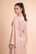 Over the shoulder portrait in the Camille beige hijab friendly velvet dress