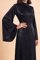 Waist and jewellery detail on the Camille black velvet evening dress