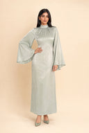 Mystic Modesty Camille light green modest evening dress with wide bell sleeves – full-length front view on model