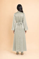 Camille sage green velvet dress, full length back view on model