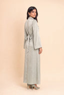 Camille light green modest velvet dress, three quarter back view, floor length cut