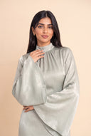 High neck close up on the Camille light green velvet dress