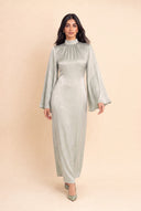 Model walking in the Camille light green modest evening dress