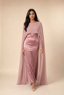 Mystic Modesty Chiffon Dream blush pink modest evening gown, walking shot, floor-length satin with sheer chiffon cape