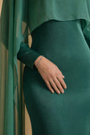 Chiffon Dream Modest Evening Dress in Emerald Green — ultra-macro detail of premium fabric texture, sheen, and refined jewelry — modeled without hijab — modest evening fashion for all — Mystic Modesty premium modest evening wear.