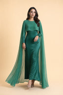 Chiffon Dream Modest Evening Dress in Emerald Green — captured in natural stride showing fabric flow and movement — modeled without hijab — modest evening fashion for all — Mystic Modesty modest evening fashion.