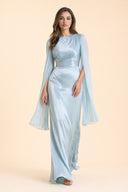Modest Luxe Satin Evening Gown in Aquatic Blue — captured in natural stride showing fabric flow and movement — modeled without hijab — modest evening fashion for all — Mystic Modesty modest evening fashion.