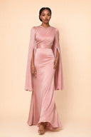 Modest Luxe Satin Evening Gown in Blush Pink — captured in natural stride showing fabric flow and movement — modeled without hijab — modest evening fashion for all — Mystic Modesty modest evening fashion.