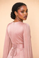 Modest Luxe Satin Evening Gown in Blush Pink — over-shoulder back profile portrait, intimate editorial close-up — modeled without hijab — modest evening fashion for all — Mystic Modesty premium hijab fashion brand.
