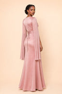 Modest Luxe Satin Evening Gown in Blush Pink — three-quarter back angle with gentle over-shoulder glance — modeled without hijab — modest evening fashion for all — Mystic Modesty modest formal wear for women.