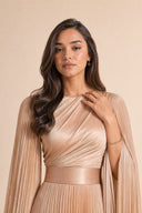 Modest Pleated Satin Gown in Champagne Cream — close-up of bodice, neckline, and upper styling detail — modeled without hijab — modest evening fashion for all — Mystic Modesty premium modest dress UK.