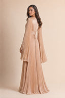 Modest Pleated Satin Gown in Champagne Cream — three-quarter back angle with gentle over-shoulder glance — modeled without hijab — modest evening fashion for all — Mystic Modesty modest formal wear for women.