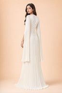 Modest Pleated Satin Gown in Ivory White — three-quarter back angle with gentle over-shoulder glance — modeled without hijab — modest evening fashion for all — Mystic Modesty modest formal wear for women.