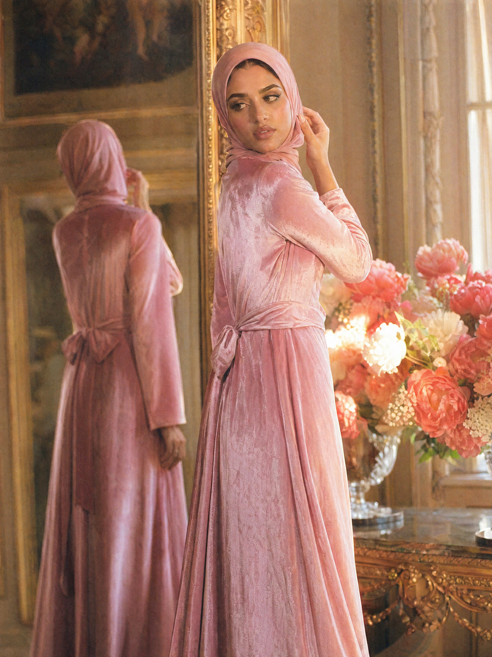 Mystic Modesty SS26— Camille Rose Pink velvet gown, intimate dressing-room moment with gilded mirror reflection, modest evening wear, Vogue editorial film aesthetic