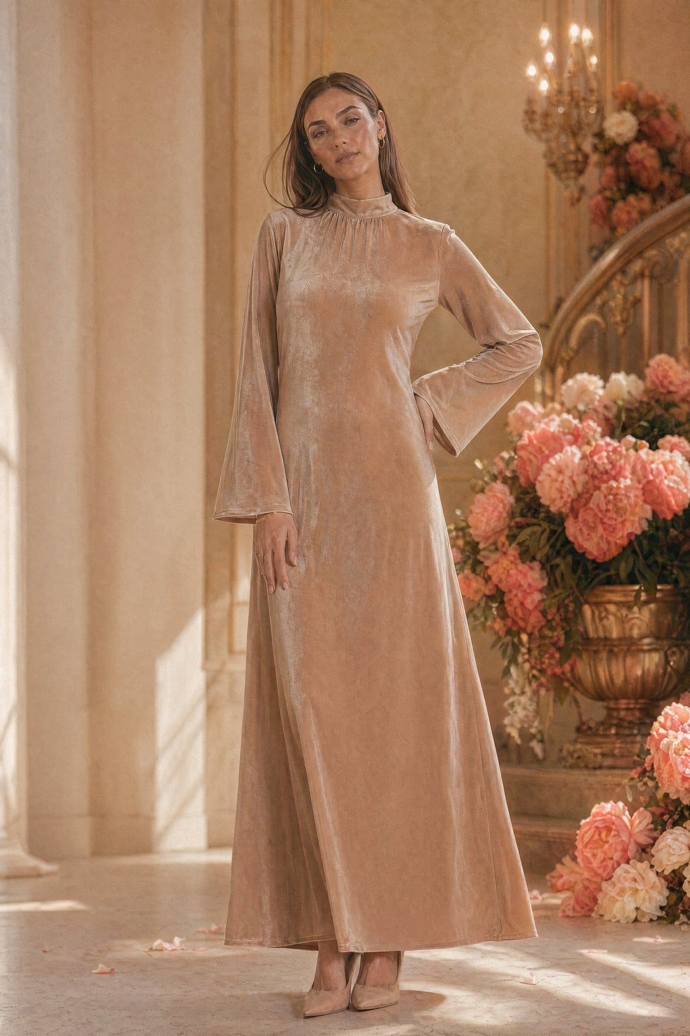 Mystic Modesty SS26— Camille Warm Beige velvet gown, studio portrait against cream backdrop with coral peonies, modest evening wear, Vogue editorial film aesthetic