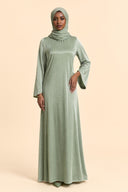 Velvet Elegance Modest Abaya Dress in Forest Green — full-body front view of the dress — modeled with hijab — Islamic modest styling — Mystic Modesty modest fashion UK.