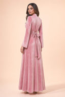 Velvet Elegance Modest Abaya Dress in Rose Pink — three-quarter back angle with gentle over-shoulder glance — modeled without hijab — modest evening fashion for all — Mystic Modesty modest formal wear for women.